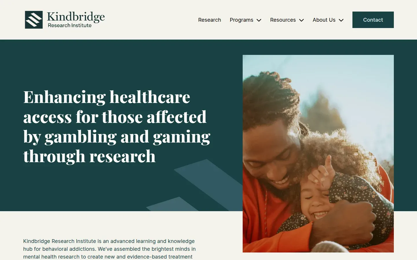 Startseite des Kindbridge Research Institute mit dunkelgrünem Hero